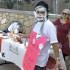 Jesus Gonzalez, senior psychology major and member of the French Club, takes pies to the face outside the Liberal Arts building in exchange for a $1 donation from students.