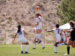 Junior forward, Angela Cutaia, wins the ball in the air against Nebraska-Omaha on Aug. 25. 