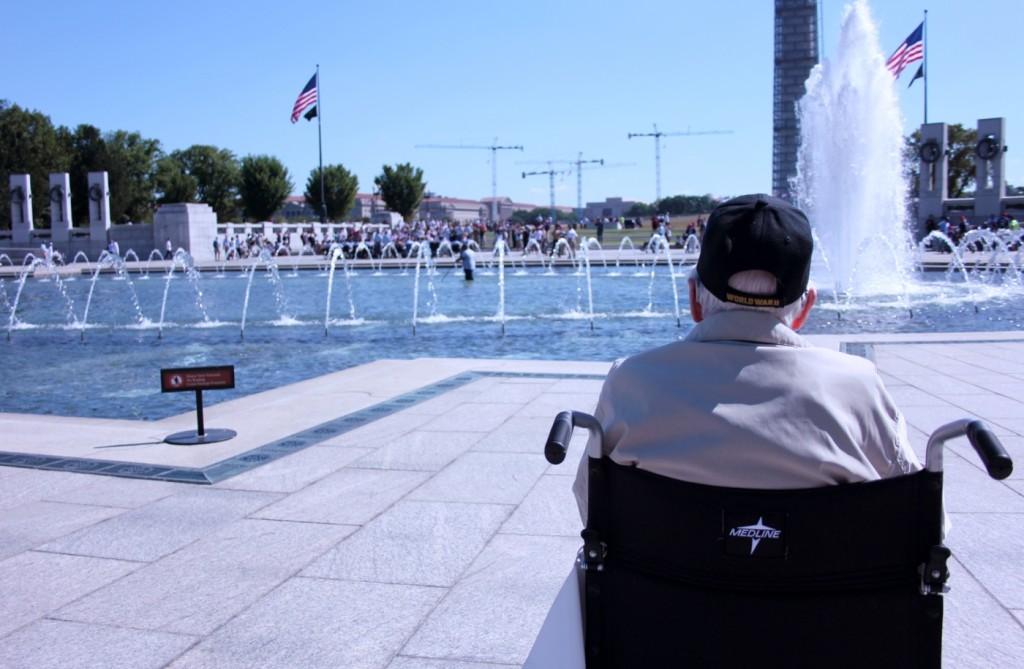 A+World+War+II+veteran+takes+a+moment+to+admire+the+National+World+War+II+Memorial.+He+was+one+of+more+than+300+veterans+who+received+a+free+trip+to+Washington+over+the+weekend.