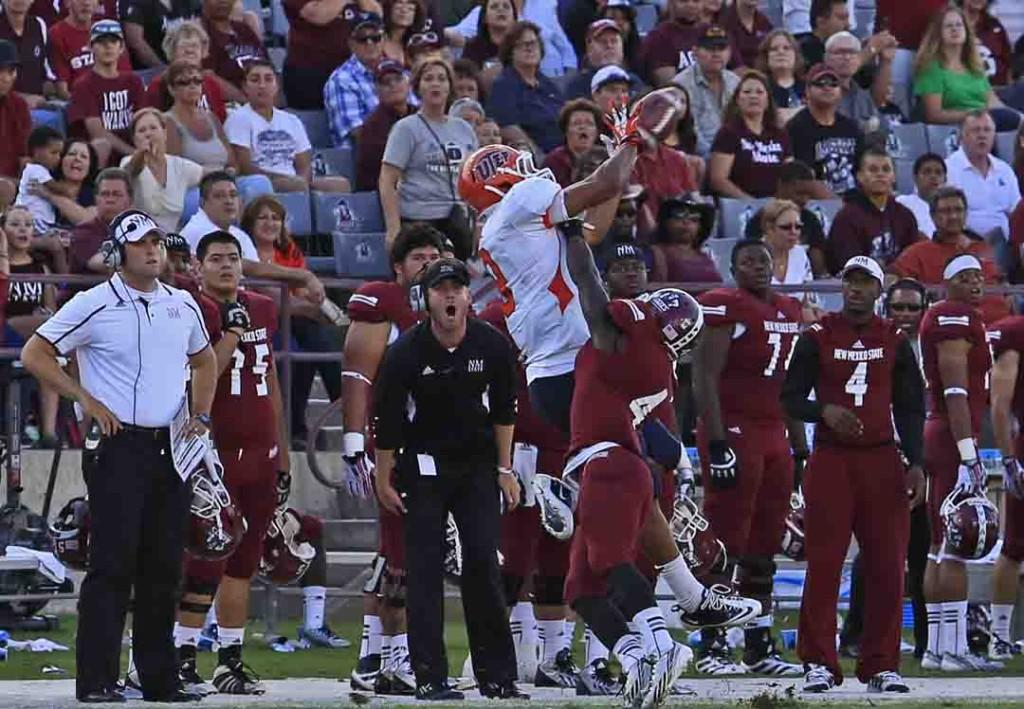 Junior wide receiver, Jordan Leslie catches the long pass from Jameill Showers in the game against NMSU on Sept. 14.
