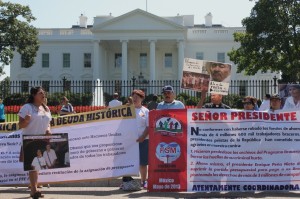 A group of former migrant laborers chants in front of the White House Thursday, “We want the President of the U.S. to know that the braceros are here demanding to see the files.” The laborers and their relatives were set to return to Mexico and California Friday.