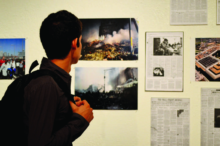 Students browsed through the recollection of publications displayed at the Union Gallery in honor of the 12th anniversary of 9/11. 