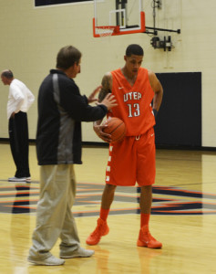 Floyd having a one-on-one with junior guard Mackenzie Moore.