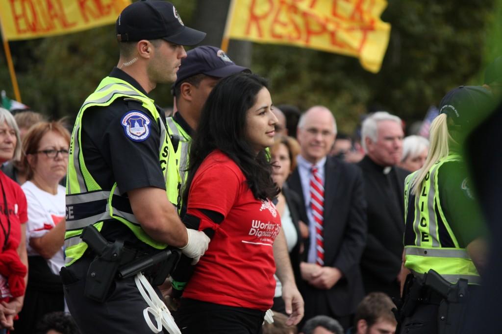 Close to 15,000 people rally for comprehensive immigration reform Tuesday at the National Mall. The march ended in front of the Capitol where officials say about 200 were arrested in an act of civil disobedience. 
