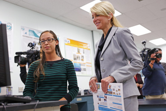 Michelle Butcher a biochemistry student at El Paso Community College shows Gubernatorial candidate Wendy Davis the series of experiments she and her colleagues have done on the influence fungus can have on maximizing a seedlings growth. For one, it was to start a lunar colony because they wanted to see what plant could withstand the harsh environment on the moon. The fungus that does tend to help the most is Penicillium.
