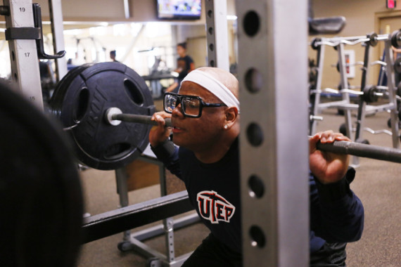 Albert Reaux, freshman criminal justice major, does squats. 