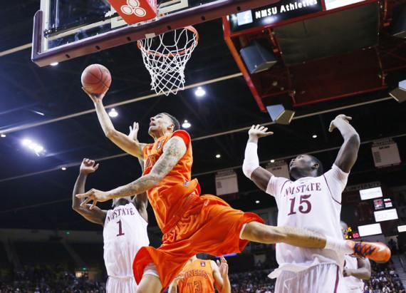 Senior center John Bohannon attempts to make a layup against New Mexico State on Nov. 15. UTEP lost 86-73.