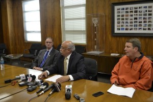 Athletic Director Bob Stull (left) vice president of legal affairs Richard Adauto (middle) and head coach Tim Floyd (right) inform the media about the three ousted players.