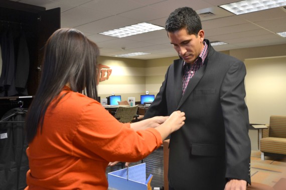 Daniel Rios visits the Career Closet to get fitted for a suit.