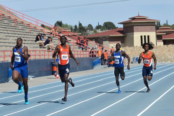 Senior runner Abiola sprints in the final stretch of the 400-meter run on March 22 at Kidd Field.