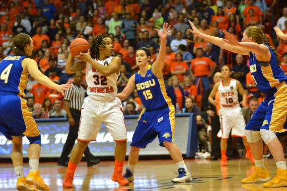 Junior guard Chrishauna Parker keep the ball away from Jackrabbits defender.