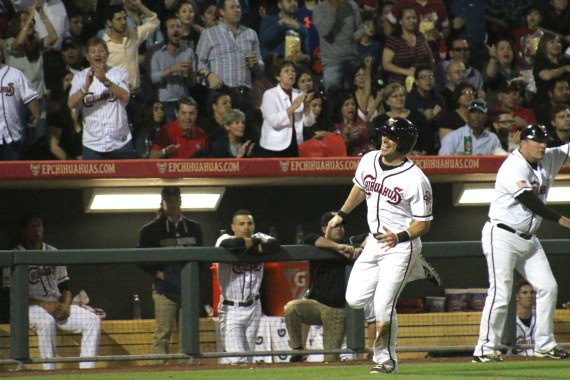 Infielder Cody Decker runs toward home plate.