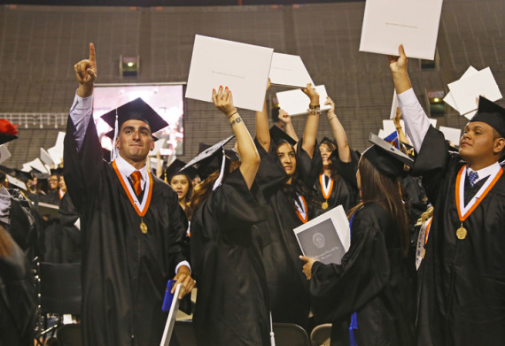 Over 2,800 students from the class of 2014 receive their diploma in the centennial commencement.