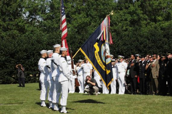 The+Navy+Color+Guard+positions+the+American+flag+and+the+U.S.+Navy+flag+in+front+of+the+crowd+in+preparation+for+the+National+Anthem+at+a+ceremony+Monday+to+honor+those+who+died+and+those+who+helped+at+last+year%E2%80%99s+Navy+Yard+shootings