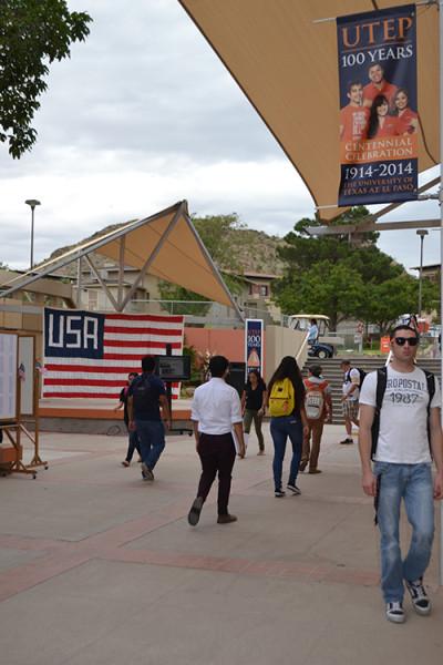 Students pass the September 11 memorial in the Union Breezeway. 