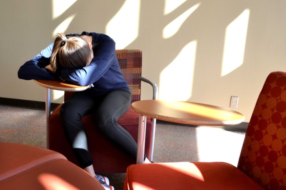 A student doses off between classes at the Union. 