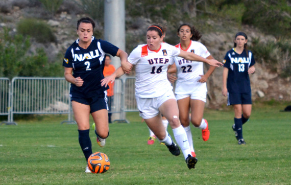 Freshman midfielder Jeanna Mullen dribbles past a Northern Arizona defender at University Field. 