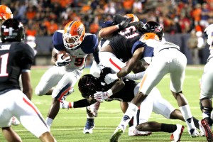 Running back Aaron Jones carries the ball on his way to a 151 total rushing yards.