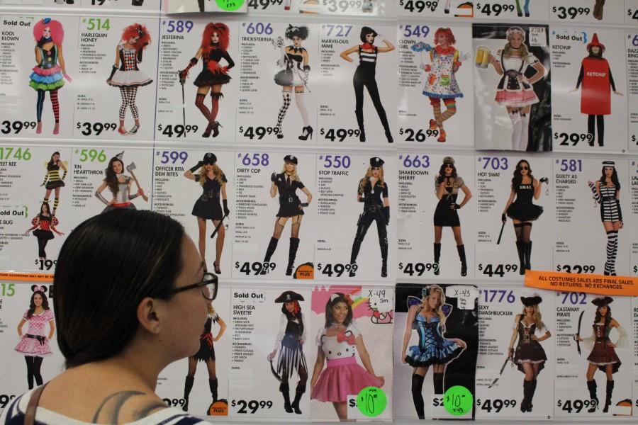 A+student+observes+prices+for+women%E2%80%99s+Halloween+costumes.