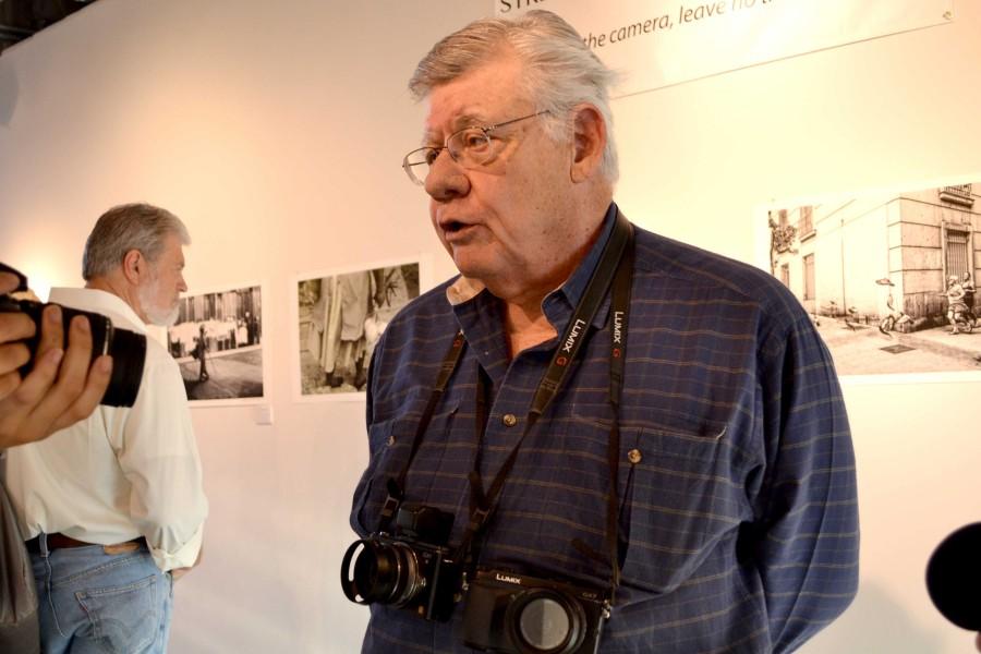 David Smith Soto speaks at his street photography exhibit on Oct. 23 at the Glass Gallery located on the third floor of the Fox Fine Arts building. The gallery will be showcased until Oct 31.