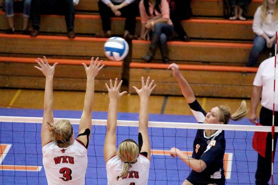 Freshman Coline Coessens attempts a attack against the Western Kentucky front line. 