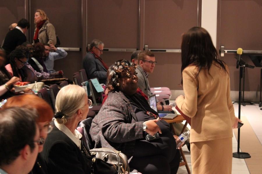 Transgender activist Earline Budd, center, speaks with guests at Thursdays Transgender Day of Remembrance event, which she helped coordinate.