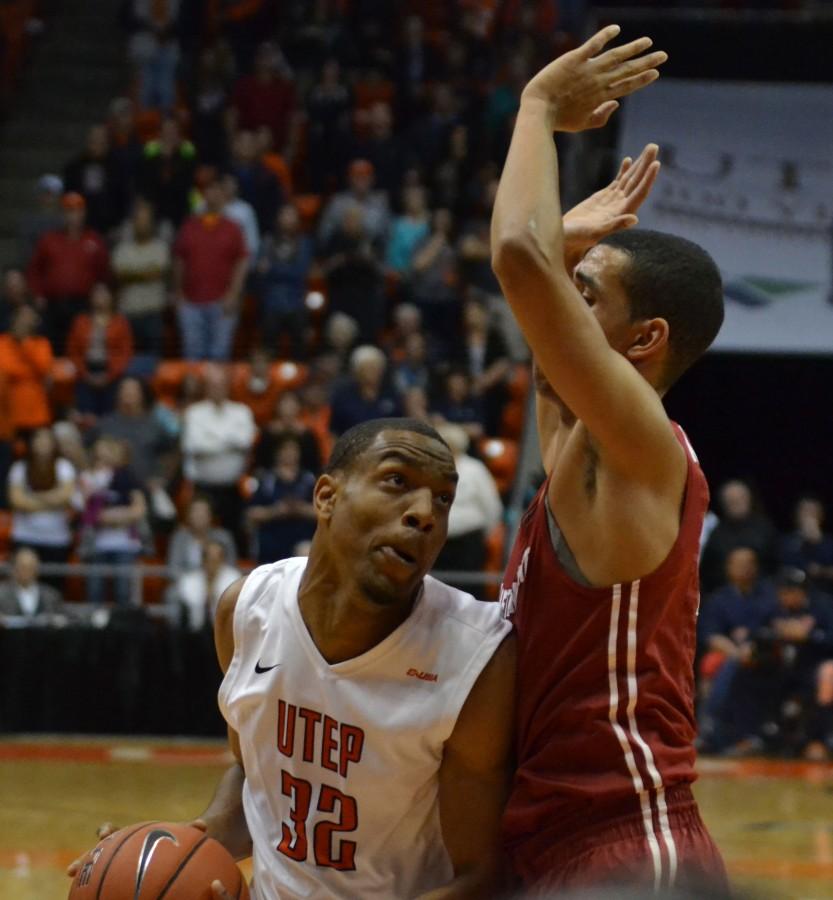 Vince Hunter fighting for a basket. 