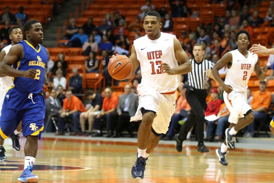 Freshman point guard Lew Stallworth pushes the ball down court in the Miners Nov. 9 exhibition against Southeastern Oklahoma.