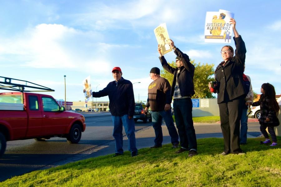 Protestors gather on Hawkins Boulevard and Montana Avenue to rally for the release of student Alexi Cruz.