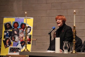 Jessica Xavier prepares to light the candle of life during Thursday's Transgender Day of Remembrance event.