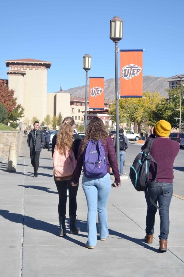 Students switch classes by the Undergraduate Learning Center.  