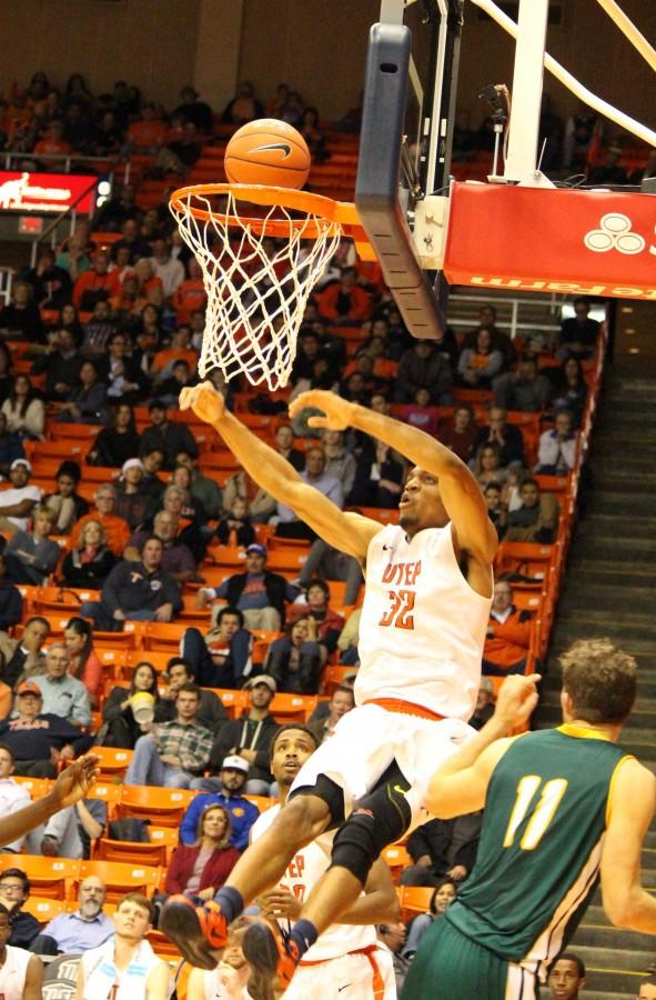 Vince Hunter goes up for a score vs SLU. 