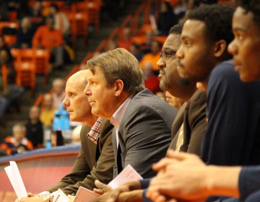 Tim Floyd observes the team against SLU. 