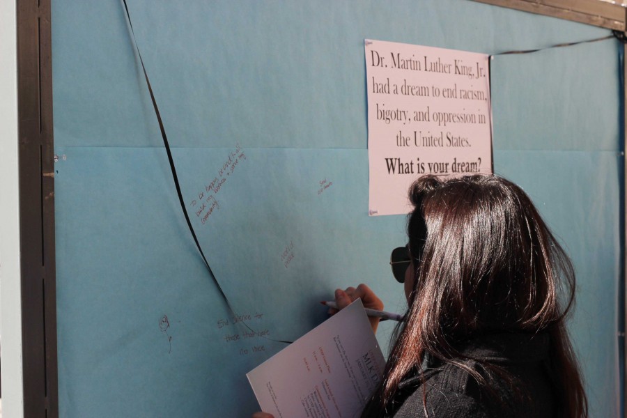 Student shares her opinion on motivational MLK board.