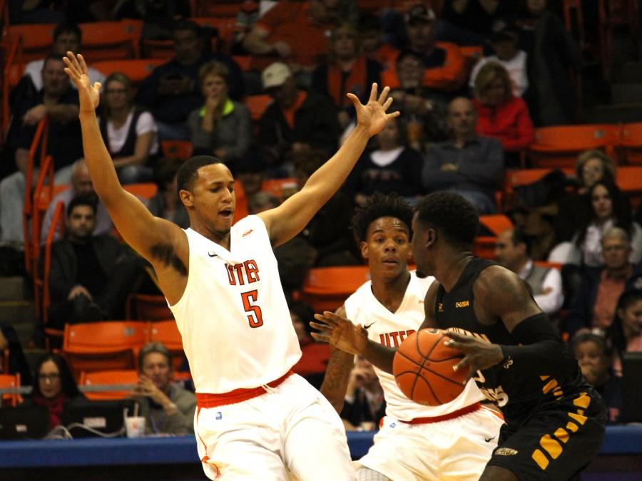 CJ Cooper defends against a Southern Miss player. 