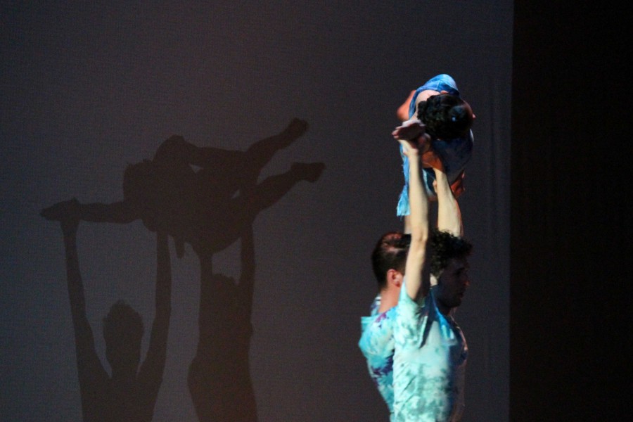 Two performers lift another for Dreamscapes. 