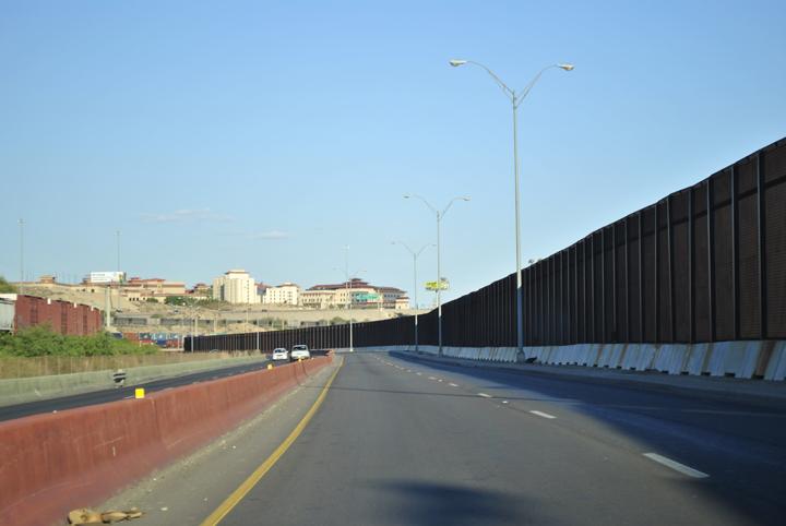 The border fence dividing the United States and Mexico.