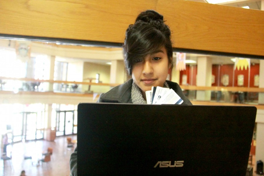 Sophomore forensic science major, Thelma Lujan looks at online shopping websites at the library.