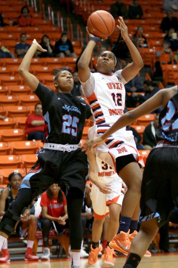 Sophomore guard Sparkle Taylor attempts a layup.