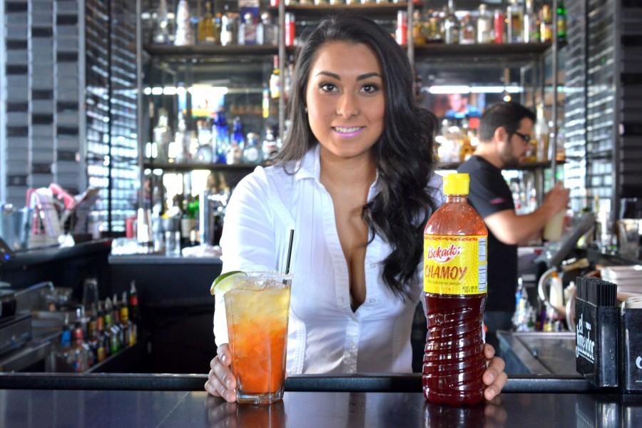 Server Cristina Tejada serves chamoy ale at Cantina Malolam, located at 4935 N Mesa St. 