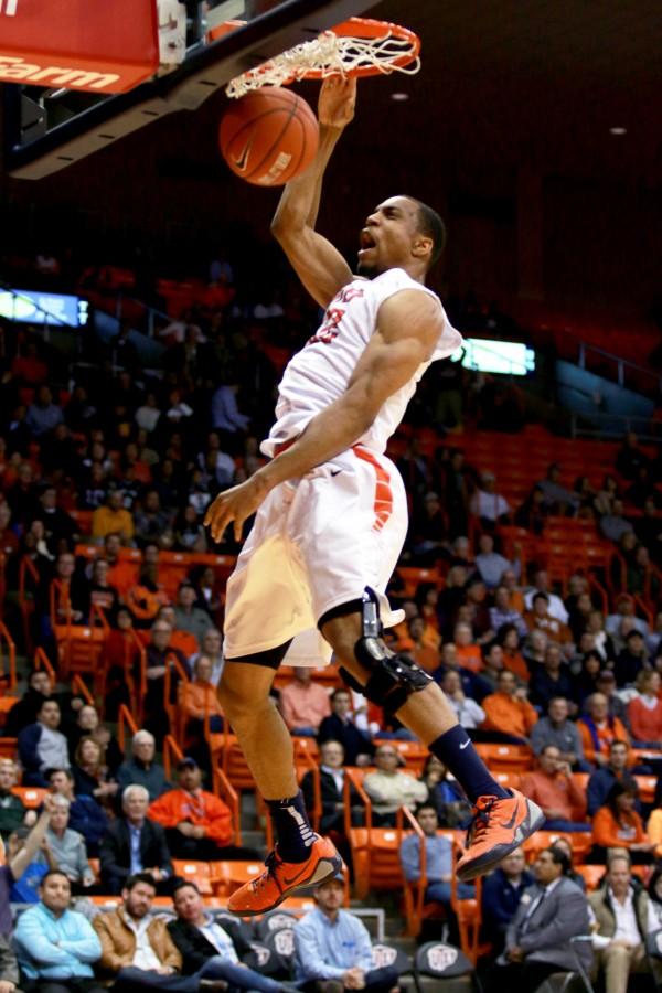 Sophomore forward Vince Hunter dunks the ball into the basket for one of his 19 points. 