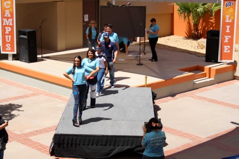 Participants of the 3rd Annual Earth Day Fashion Show walk on the runway. 