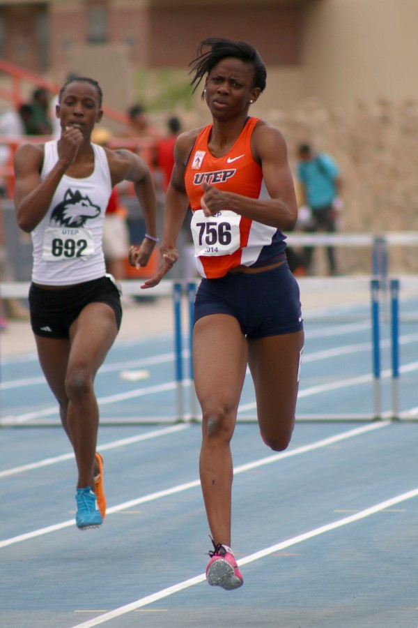 UTEP Senior hurdler Anna-Kay James sprints to the finish line.