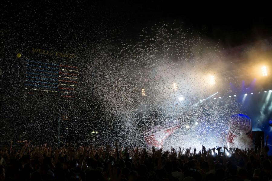 Confetti covers the crowd during the closing of the first of three days of NDMF.