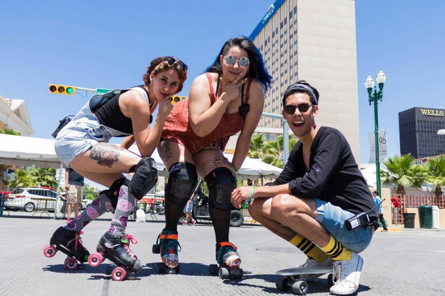 UTEP students Audrey Russel and Irving Miramontes (Left and Right) pose with fellow Neon Desert worker Sara Mata (Middle) 