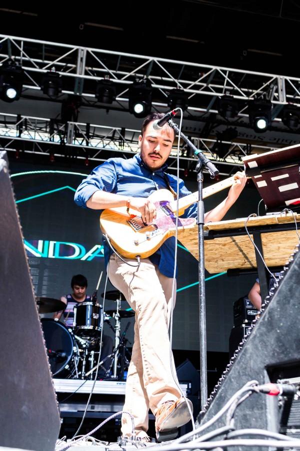 Lead singer Oscar from Avingdale performs a song onstage at Neon Desert. 