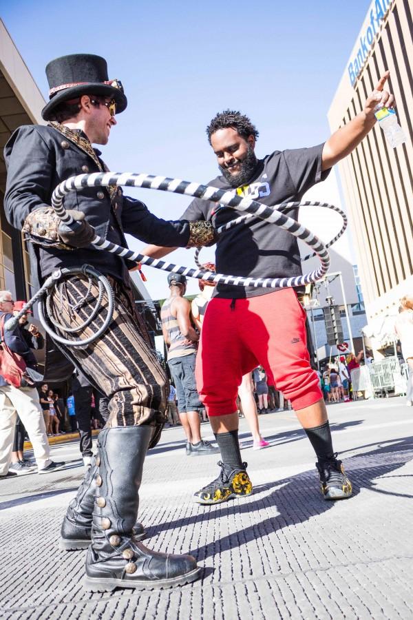 Rapper Bas enjoys some time on the Neon Desert Festival grounds after his performance.