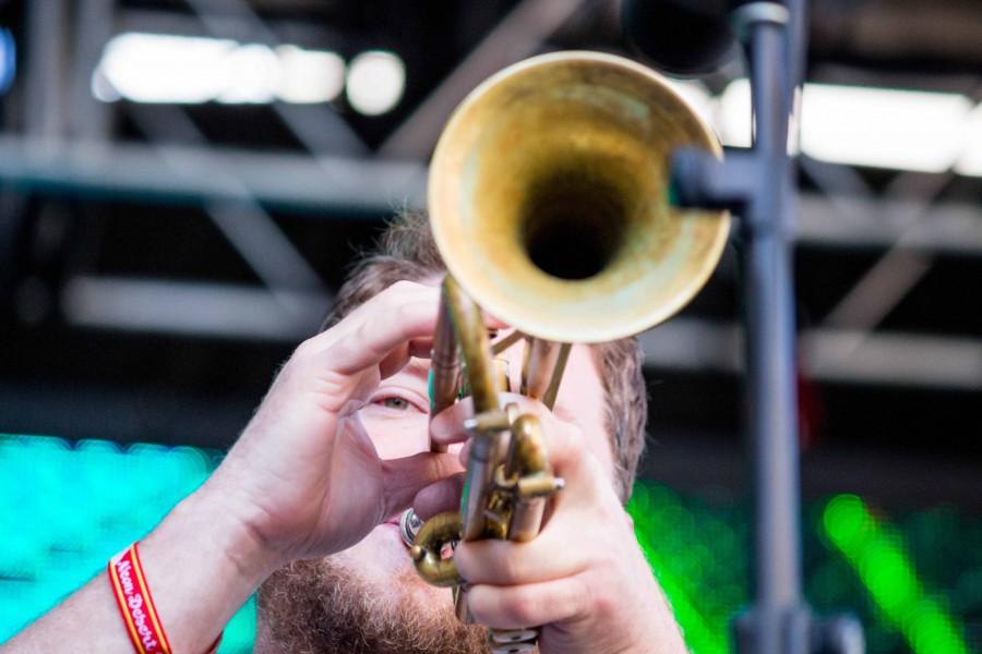 Trumpet player Jon Durbin performs a solo with The Suffers. 