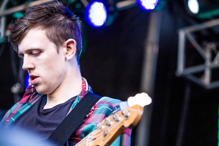 Tokyo Police Club bassist David Monks performs onstage. 