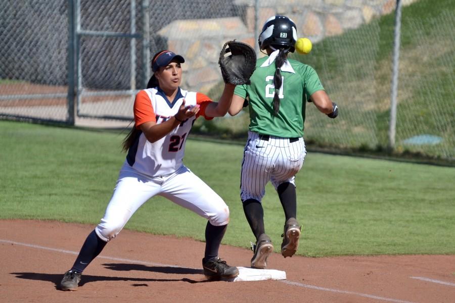 UTEP first baseman Courtney Clayton attempts to make a catch.